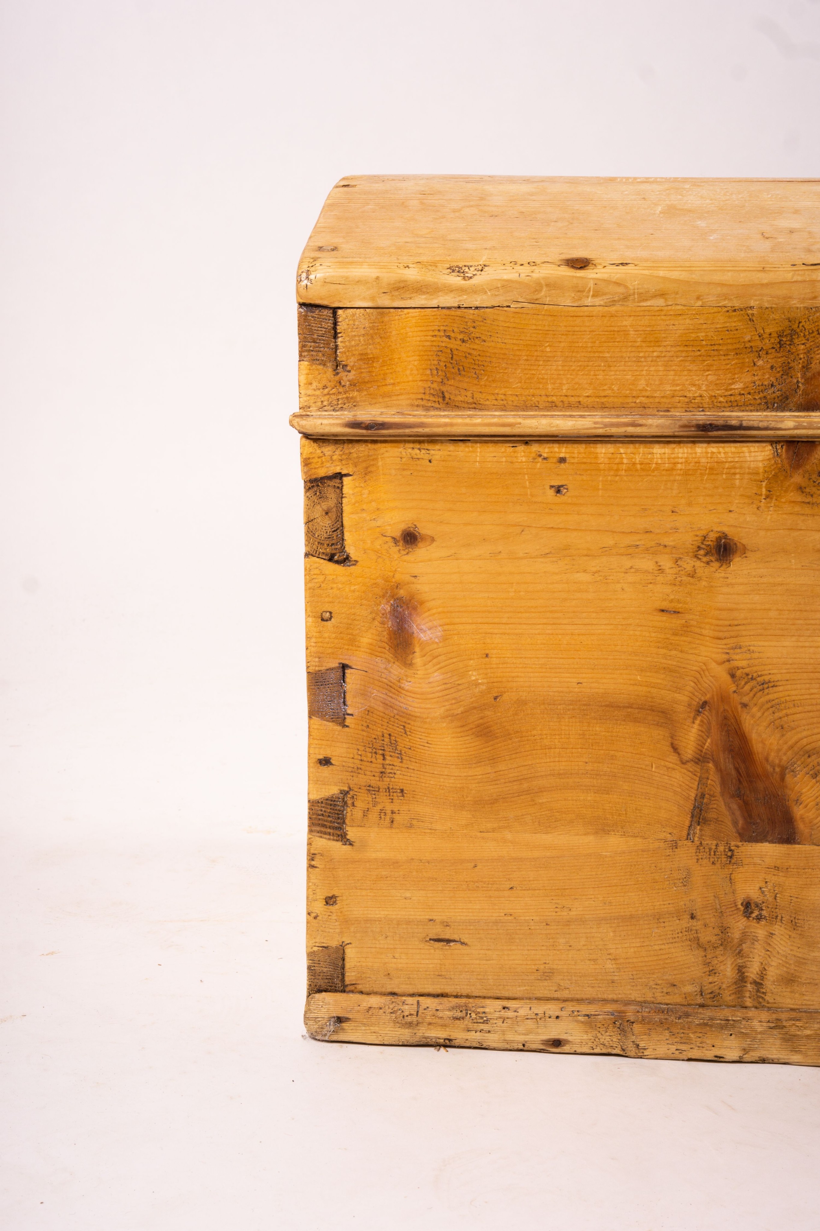 A small 19th century Continental pine domed top trunk, length 74cm, width 40cm, height 46cm